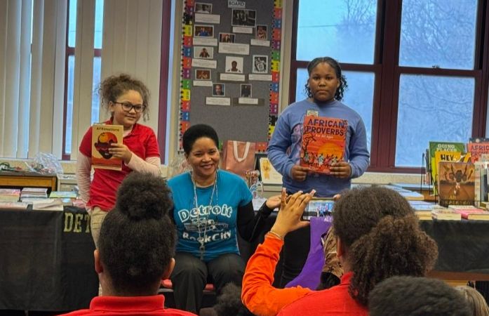 Students and Guest Read Books together